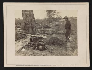 A buried Union soldier and an unburied Confederate soldier near the West Woods at Antietam (Courtesy of the Library of Congress)